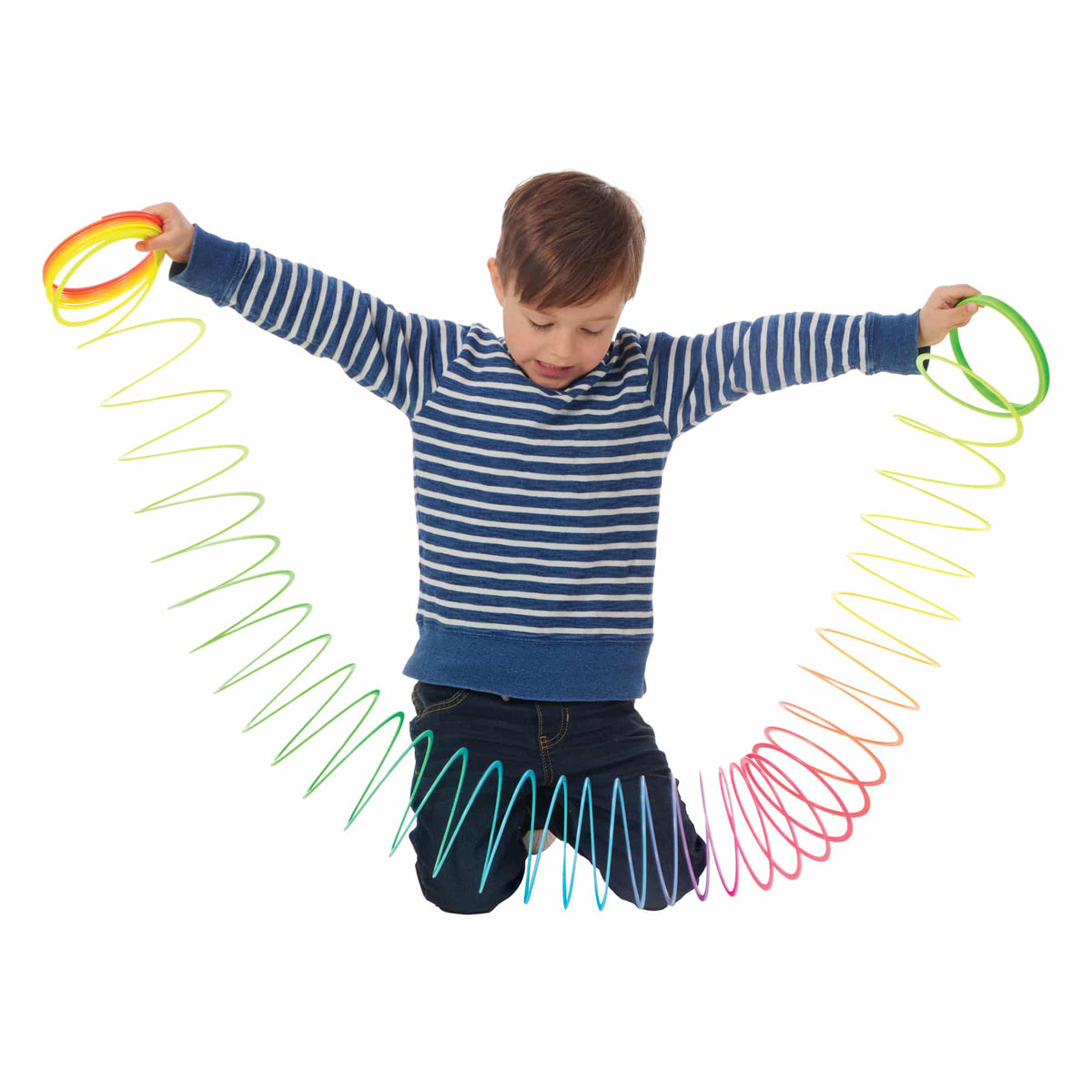 Jumbo Rainbow Sproing Lifestyle with boy stretching out the spring