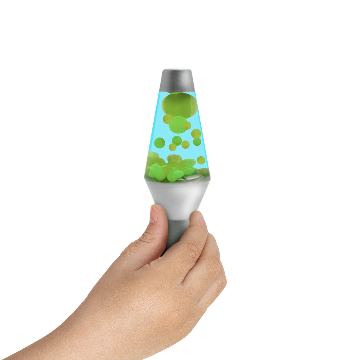 A small hand holding a miniature Lava Lamp with green floating globs inside. The lamp has a silver base and cap, and the liquid inside is blue. The background is white.