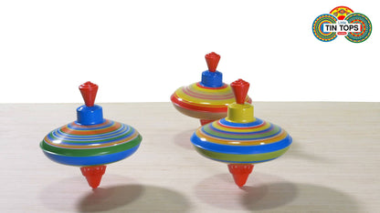 Colorful spinning mini tin tops video