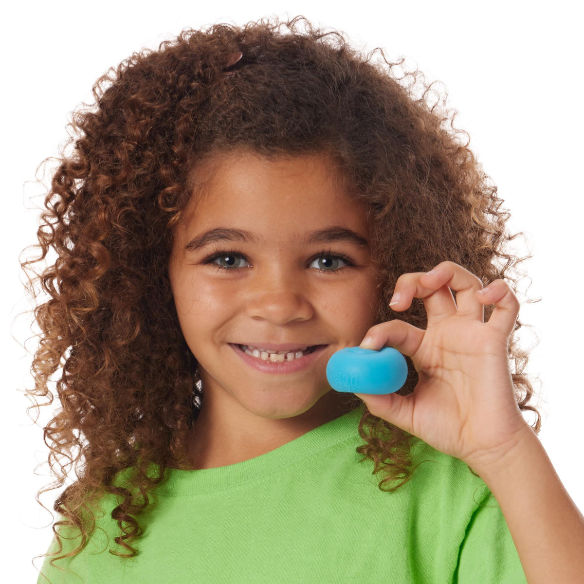 Girl squeezing a blue Teenie NeeDoh